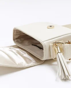 Girls cream embossed monogram cross body bag