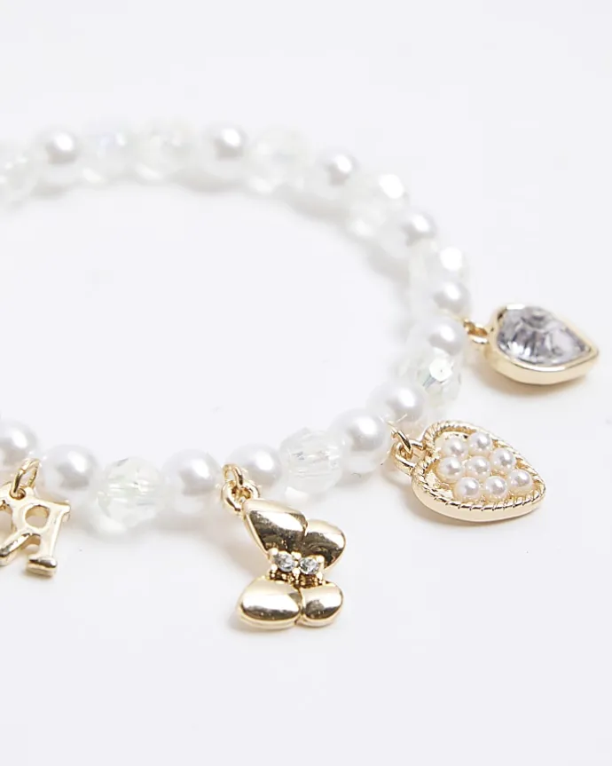 Girls cream pearl charm bracelet