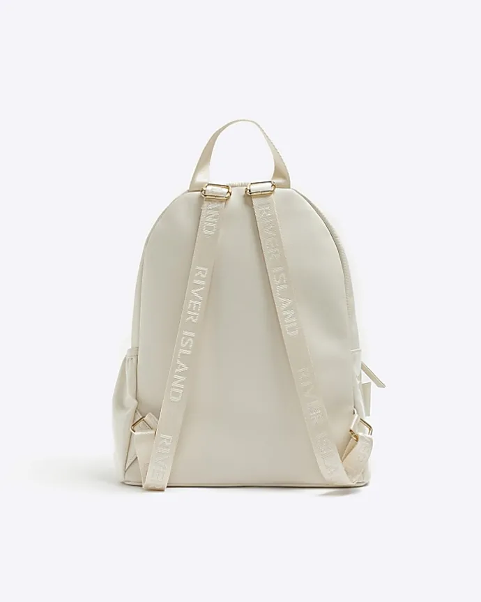 Girls cream quilted bow detail backpack