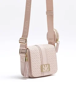 Girls pink embossed RI cross body bag