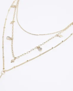 Gold charm multirow necklace