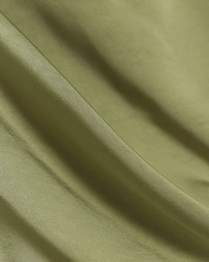 Green satin open back jumpsuit