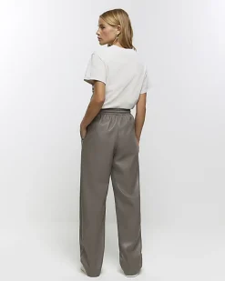 Grey faux leather wide leg trousers