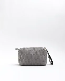 Grey quilted makeup bag
