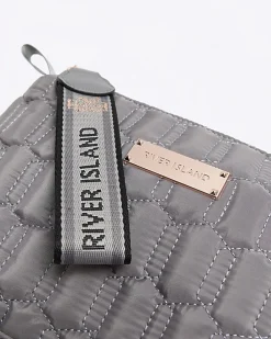 Grey quilted makeup bag