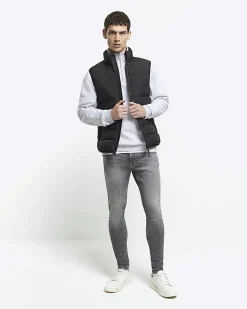 Grey super skinny spray on faded jeans