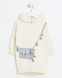 Mini girls cream bag graphic hooded dress