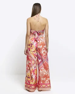 Orange floral wide leg trousers