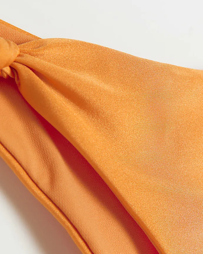 Orange low rise knot bikini bottoms