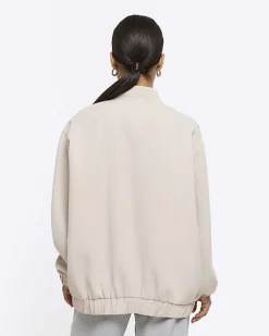 Petite beige oversized bomber jacket