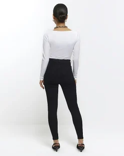 Petite black bum sculpt skinny jeans