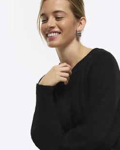 Petite black long sleeve jumper mini dress