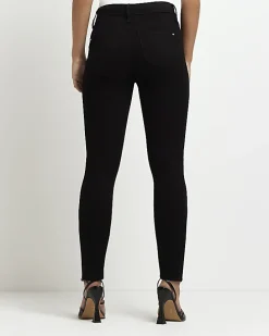 Petite black Molly mid rise skinny jeans