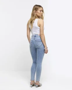 Petite blue high waisted ripped jeggings