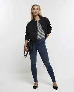 Petite blue mid rise skinny jeans