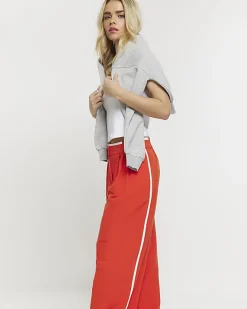Petite red side stripe wide leg trousers