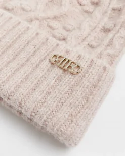 Pink cable knit beanie hat