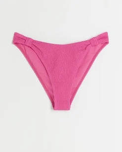 Pink low rise knot bikini bottoms