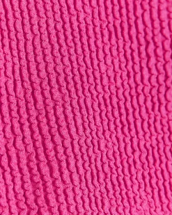 Pink low rise knot bikini bottoms
