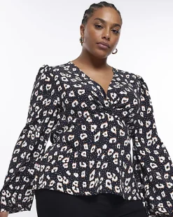 Plus black spot long sleeve blouse