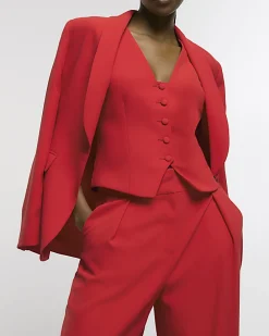 Red pleated wide leg trousers