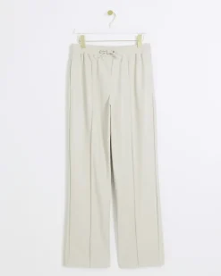 Stone faux leather wide leg trousers