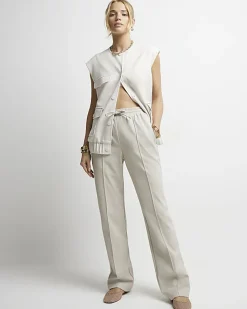 Stone faux leather wide leg trousers