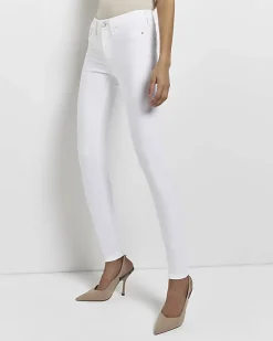 Tall white molly mid rise super skinny jeans