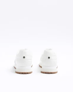 White embossed trainers