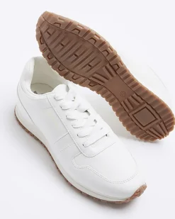 White embossed trainers
