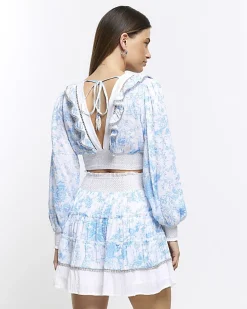 White floral shirred crop long sleeve top