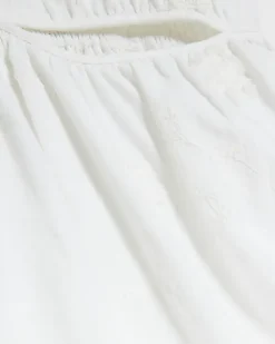 White textured cut out playsuit